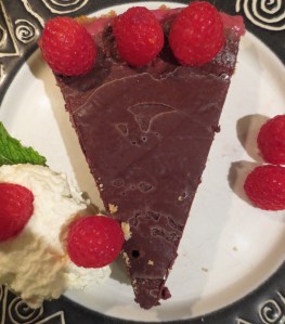 Chocolate Ganache Raspberry Tart with whipped cream