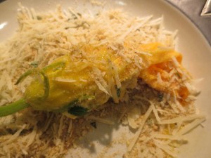 squash blossoms rolled in breadcrumbs and cheese