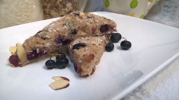 gluten free and vegan! scones bursting with juicy blueberries and dusted with coconut and almonds, yum!